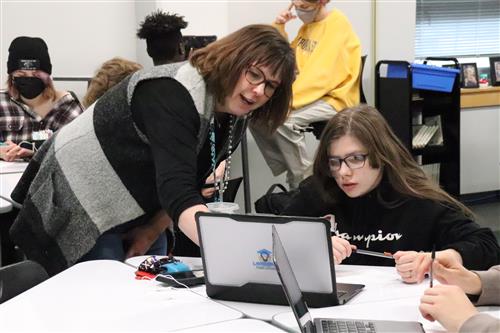 Teacher Working with Student